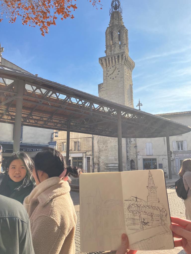 students sketching the city of Avignon