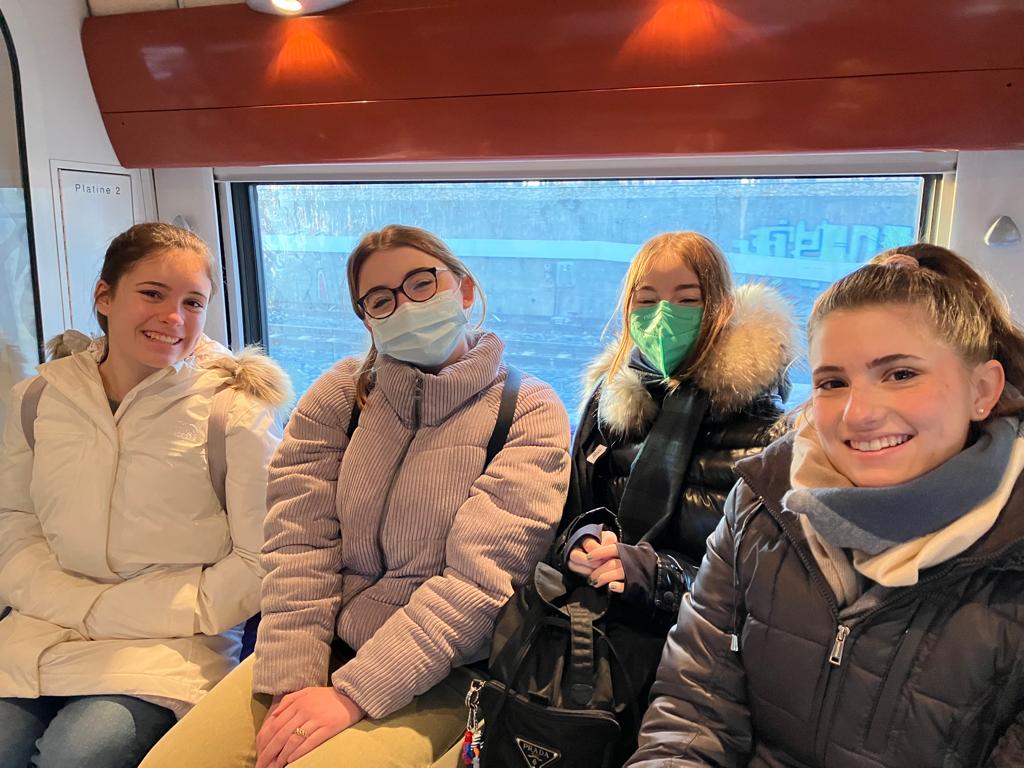 students riding a train to Marsailles