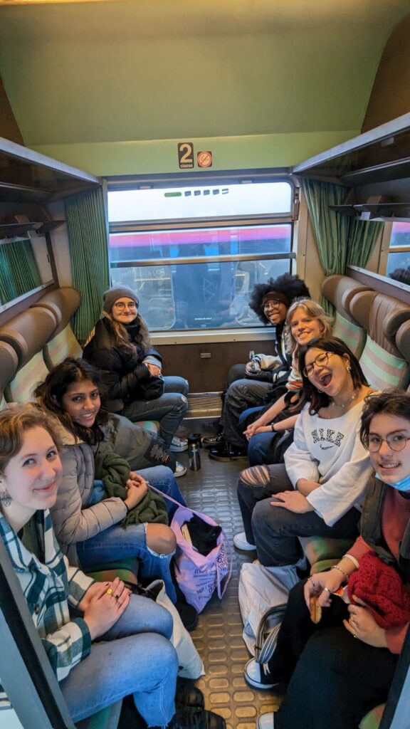 students riding a train