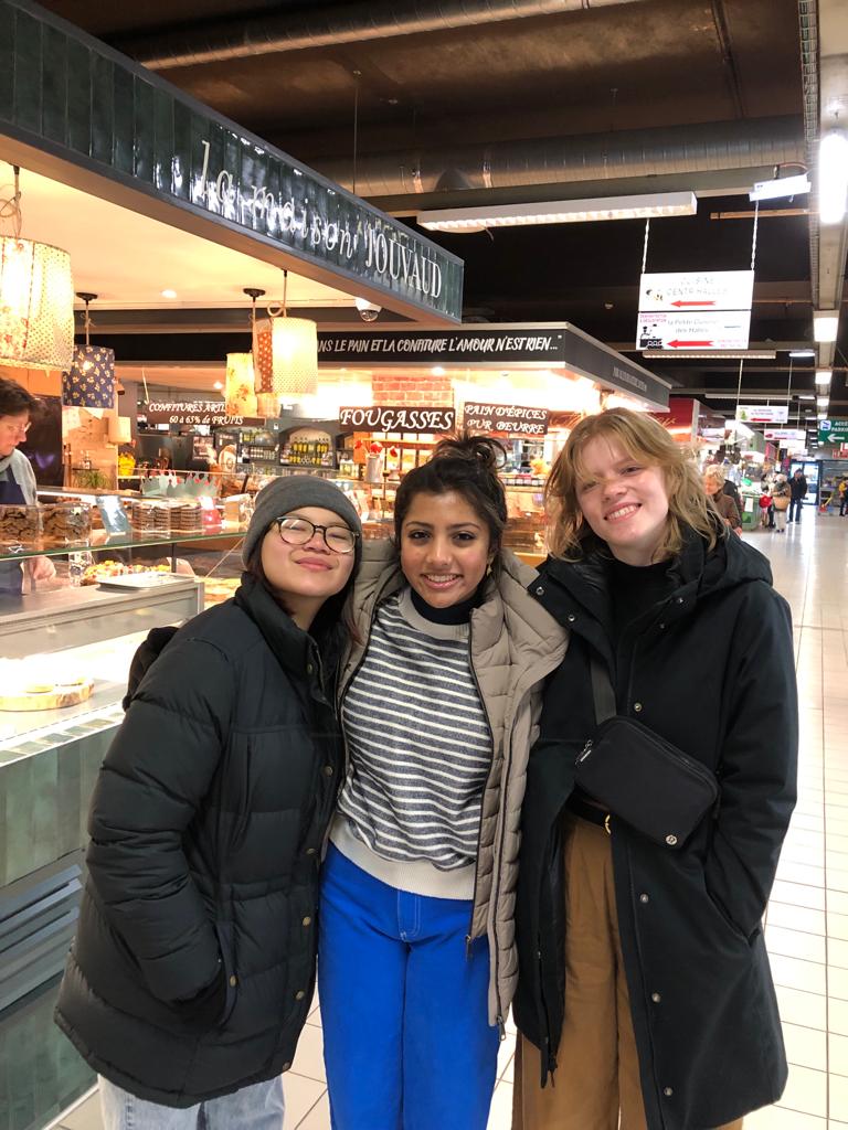 students at a French market