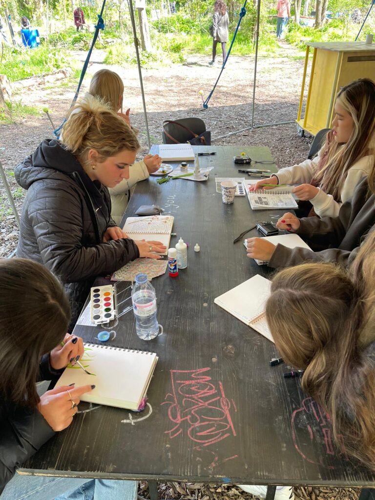 MPS students journaling at a garden in Berlin