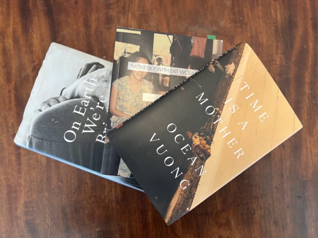Three of Ocean Vuong's books of poetry