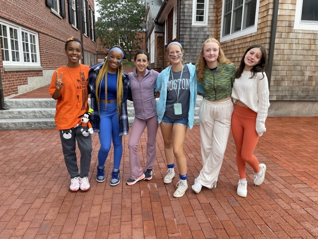 six girls posing for photo