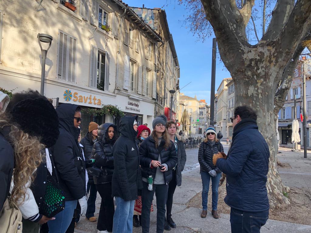 students on a walking tour of Avignon