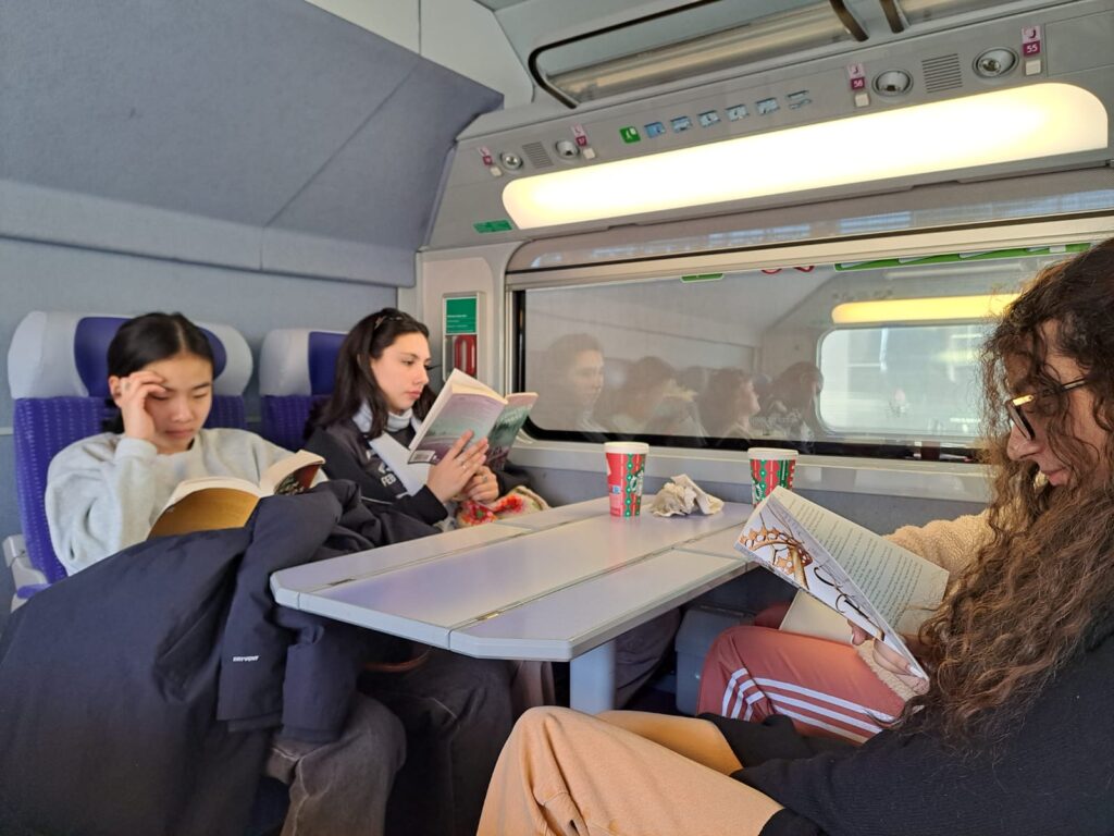 students riding a train to Marsailles